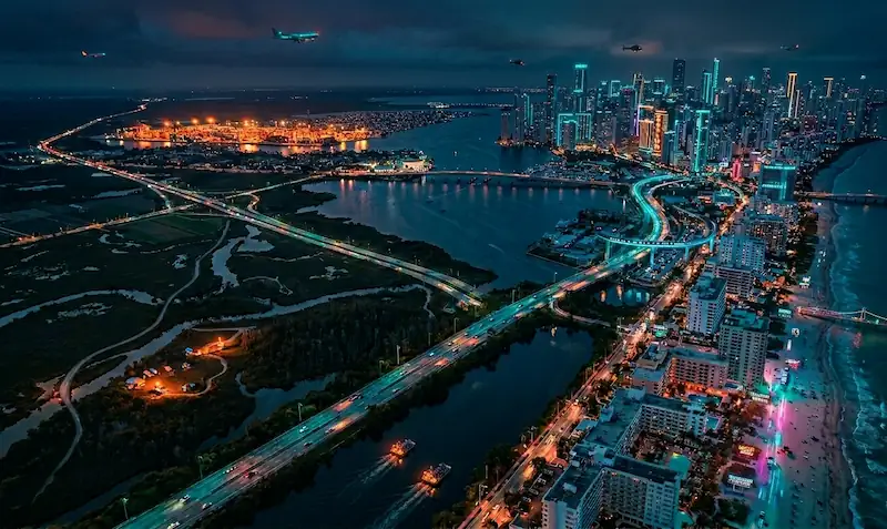GTA 6 Vice City map — aerial night view showing urban skyline, coastline, swamps and highways